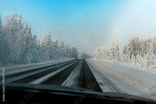 A view from a car on an icy road in Lapland, Finland