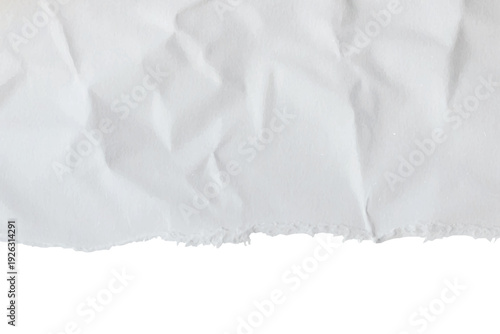 White crumpled paper texture with torn edge.Ripped white paper with shadow on white background.Blank white sheet of paper with jagged edges.