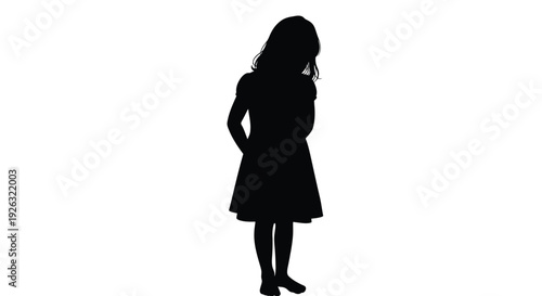 Silhouette of a pregnant woman standing with her hand on her belly