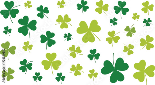 A festive pattern of green shamrocks scattered across a white background.