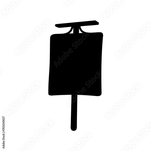 A silhouetted bulletin board with a small overhang, supported by a post