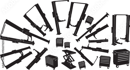 Collection of various black metal equipment and tools arranged