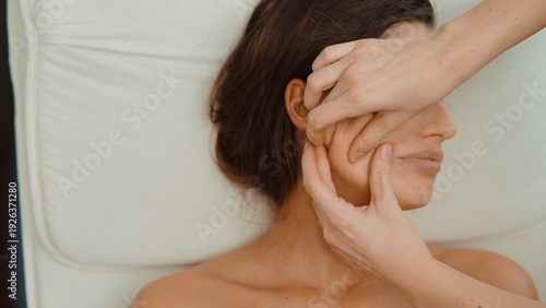 Lymphatic drainage and contouring through facial pressing method