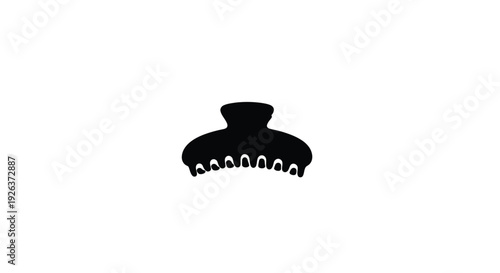 Black hair clip isolated on a white background a simple silhouette