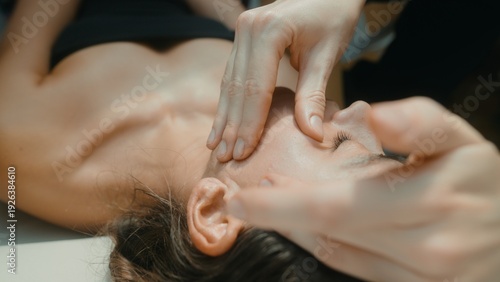 Professional treatment focusing on relaxing facial and neck fascia