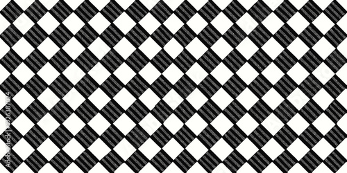 A geometric pattern composed of repeating diamond shapes in black and white contrast Vector