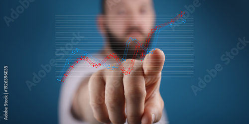 Hand touching a rising fina...