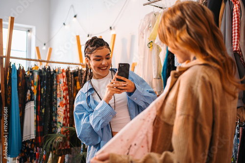 Enthusiastic Photographer Capturing Trendy Blossoms Amidst Vibrant Environment With Dazzling Illumination