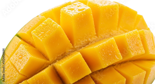 Close up of diced mango fruit with water drops on transparent background