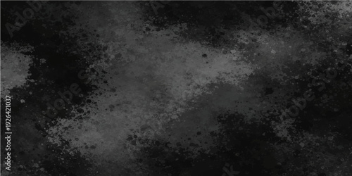 An aged dark gray concrete wall with a rough stone texture and dirty black grunge patterns creates a vintage textured surface background on this blank grungy cement floor