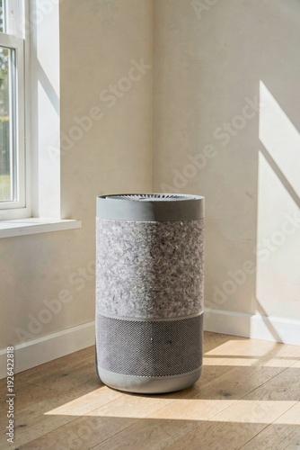 Grey felt air purifier with mesh texture in minimal interior