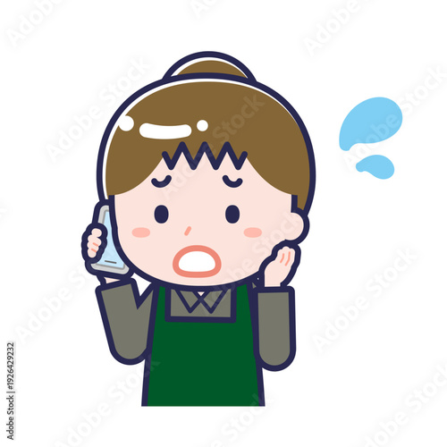 スマートフォンを使う「飲食店の店員」の女性