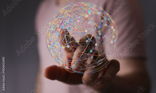 Hand holding a digital glob...