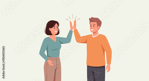 Two smiling coworkers, a woman and a man, high five each other in celebration of an achievement, symbolizing teamwork, success, and positive workplace collaboration.