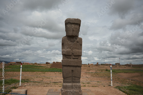 Ponce Monolith at Tiwanaku Archaeological Site under Dramatic Cloudy Sky, La Paz, Bolivia