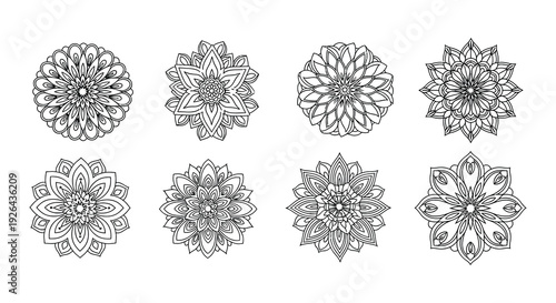 Intricate black and white floral mandala designs arranged in a grid