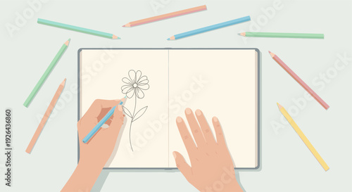 Illustration of hands drawing a simple flower sketch with a blue colored pencil in an open notebook surrounded by pastel colored pencils on a light surface.