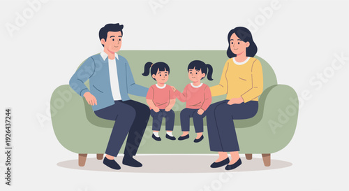Happy family of four sits together on a green sofa, smiling with comforting mood; dad, mom, and two cute daughters spend time.
