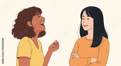 Two young women are in conversation and laughing; one has short brown curly hair and a yellow shirt while the other has long black hair and an orange shirt.