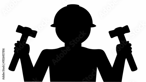 Worker in hard hat holding hammers confidently