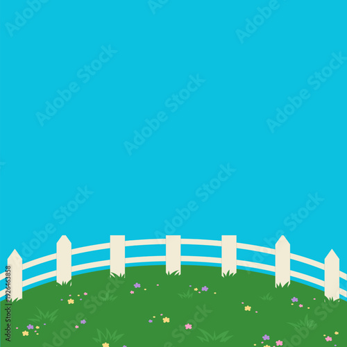 Serene landscape with white picket fence on green hill