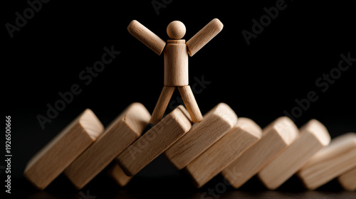 Wallpaper Mural Wooden figurine workforce adjustment balance resilience success leadership motivation teamwork perseverance standing on top of falling blocks symbolizing overcoming challenges and positive emotion Torontodigital.ca
