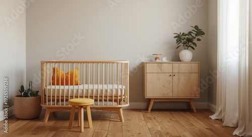 Cozy baby room scene with a cot featuring an orange cushion beside a yellow stool and a plant adorned cabinet