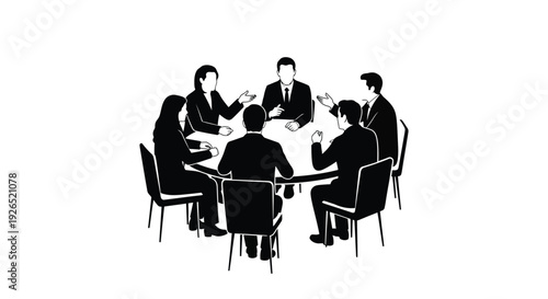 A group of people seated around a table in a business meeting