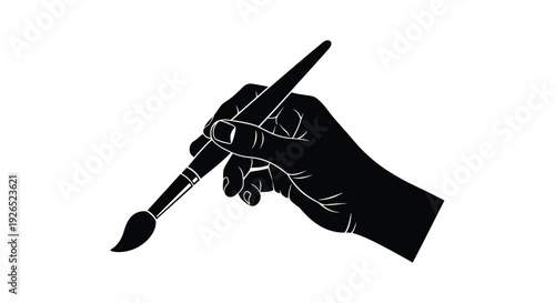 A black silhouette of a hand firmly holding a paintbrush
