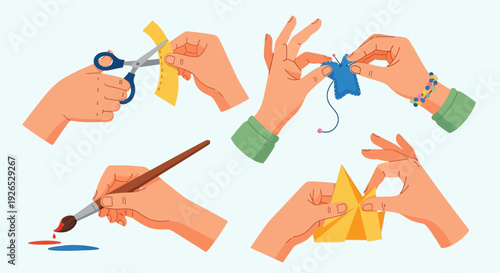 Creative hands crafting and creating artwork with scissors, paintbrush, and paper from a top view perspective