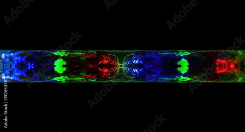 Dynamic multi color kaleidoscopic interference pattern from laser reflection in crystal rod