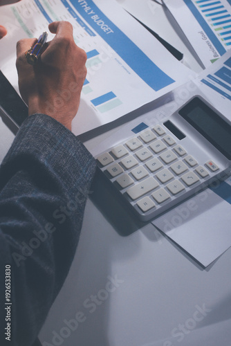 Bild auf Leinwand Professional photo of a person's hands reviewing a contract or legal document on