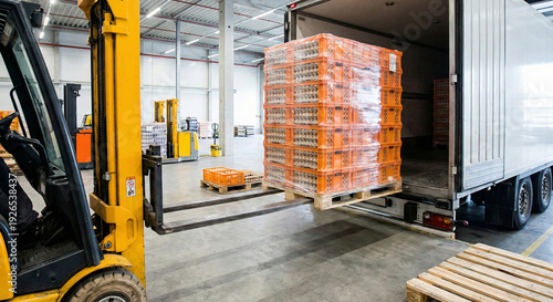 Warehouse forklift moving orange crates 4K