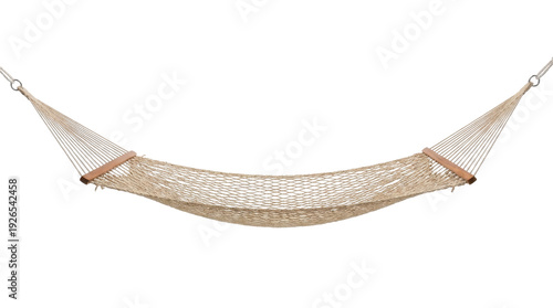 A woven beige hammock with wooden ends is suspended against a black background, suggesting a space for relaxation and leisure.