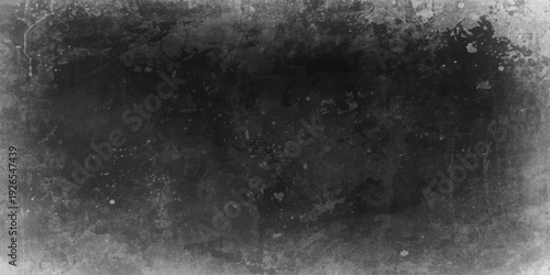 A dark and vintage abstract grunge background features a rough black and white textured stone surface with a dirty grey concrete pattern and an old weathered frame for a blank antique design