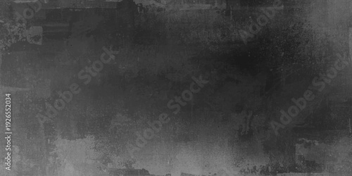 A dark vintage grunge paper texture background with a grey concrete pattern and dirty black surface design for a blank weathered wall backdrop