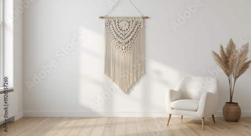 White wall in cozy living room with macrame and armchair offering free copy space