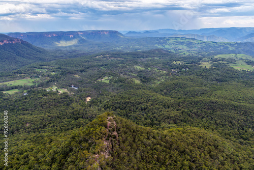 Aerial view over Hargraves Lookout in the Blue Mountains showcasing dramatic escarpments and expansive Grose Valley wilderness.