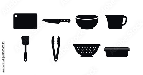 Kitchen meal prep essentials: cutting board, chef knife, mixing bowl, measuring cup, spatula, tongs, colander, food storage container