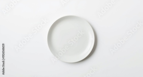 Wallpaper Mural Plain background featuring white ceramic round plate with shadow top perspective Torontodigital.ca