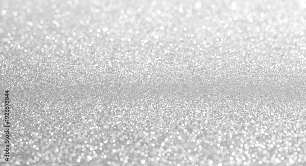 Fototapeta premium Silver sparkling glitter texture background with soft daylight and copy space