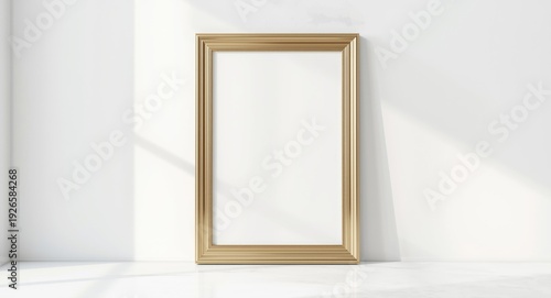 Vertical gold framed display set against a crisp white wall ready for artwork