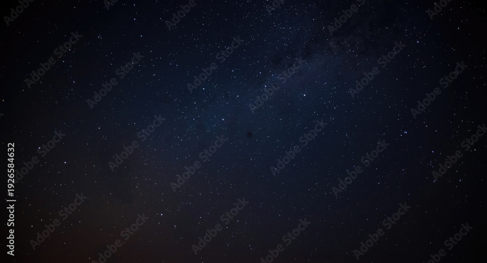 Fototapeta premium Distant stars glowing softly in the vast cosmos
