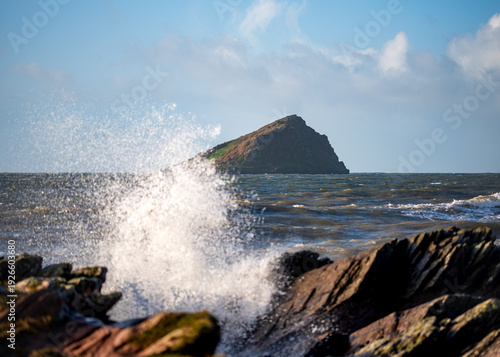 Crashing waves looking out a the Great Mew Stone from Wembury, Devon, UK