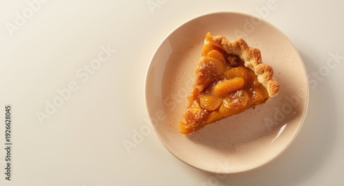 High detail overhead shot of an egg free carrot raisin pie slice focused on health with copy space