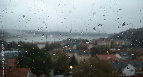 Wet window overlooking a mi...