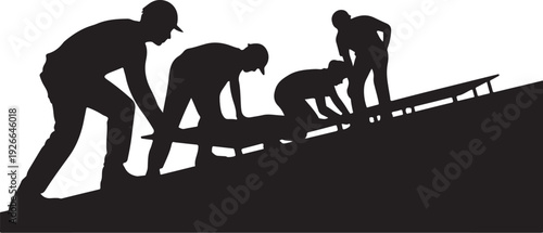 Silhouette of four workers installing roof shingles