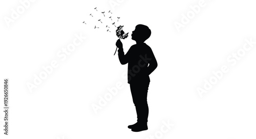 Child blowing dandelion seeds into the air a striking silhouette