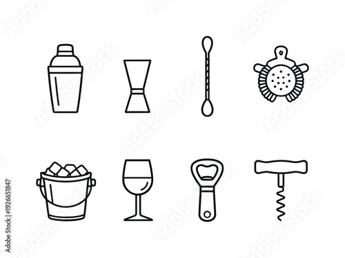 Home cocktail bar tools: cocktail shaker, jigger, bar spoon, strainer, ice bucket, wine glass, bottle opener, corkscrew