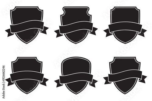 Black shield badge set with curved ribbon banner